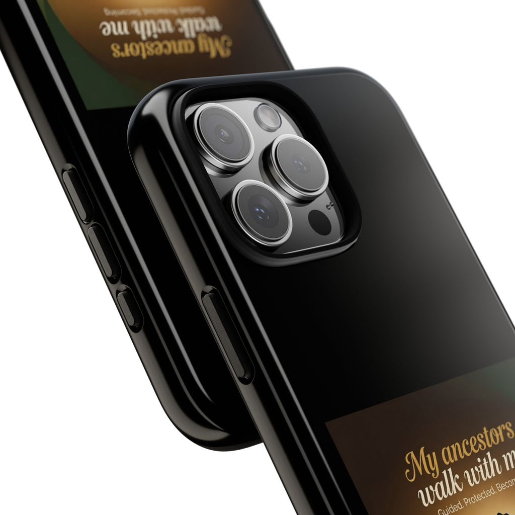 Black phone case with inspirational design honoring heritage, featuring the phrase "My Ancestors Walk With Me" on a protective cover.