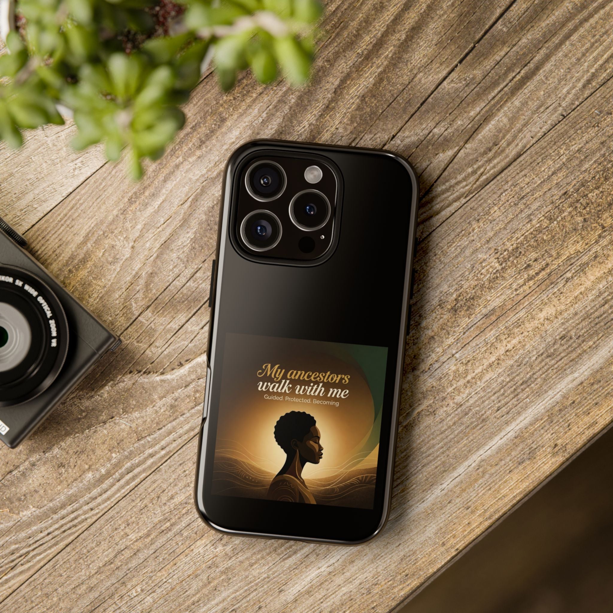Black protective phone case with inspirational design honoring ancestors and Black heritage, compatible with smartphones.