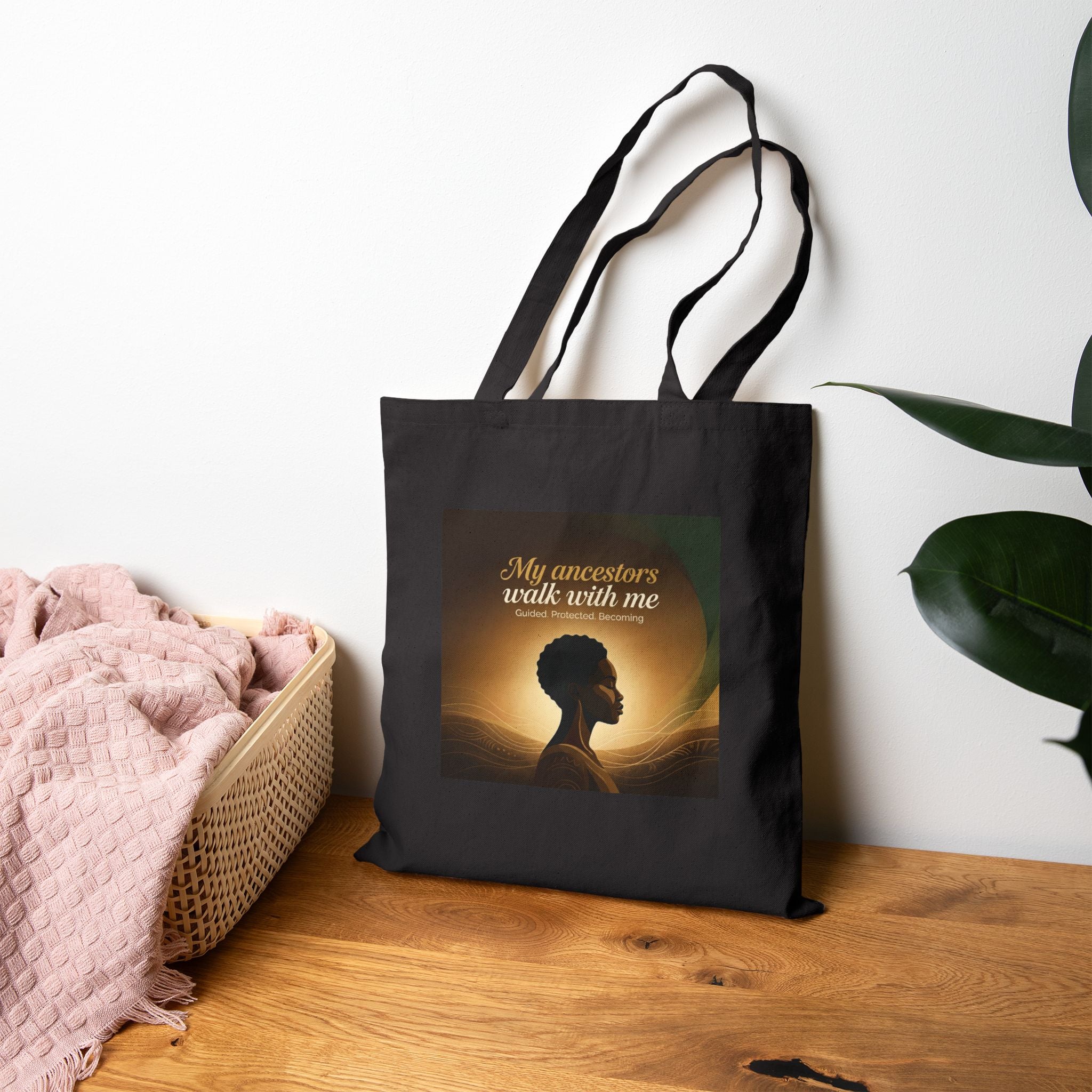 Canvas tote bag with "My Ancestors Walk With Me" silhouette design, featuring inspirational artwork on a sturdy bag.