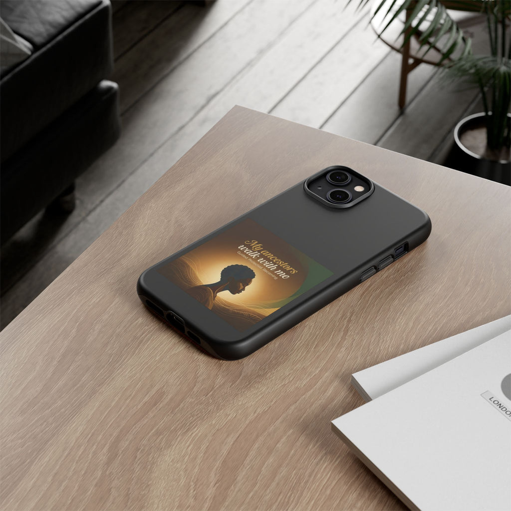 Black phone case with inspirational message honoring ancestors, designed for protection and cultural pride.