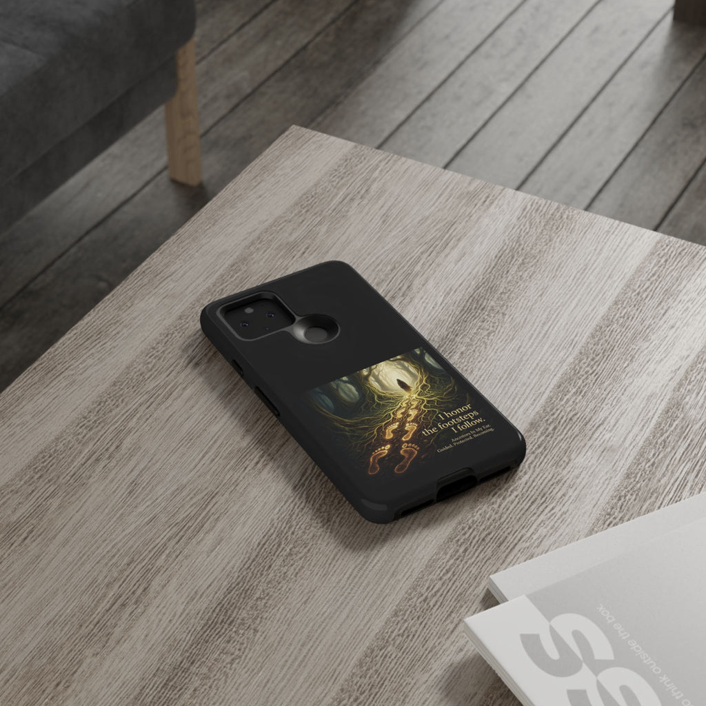 Printify phone case with forest trail design and the quote "I Honor the Footsteps I Follow" on a protective cover.