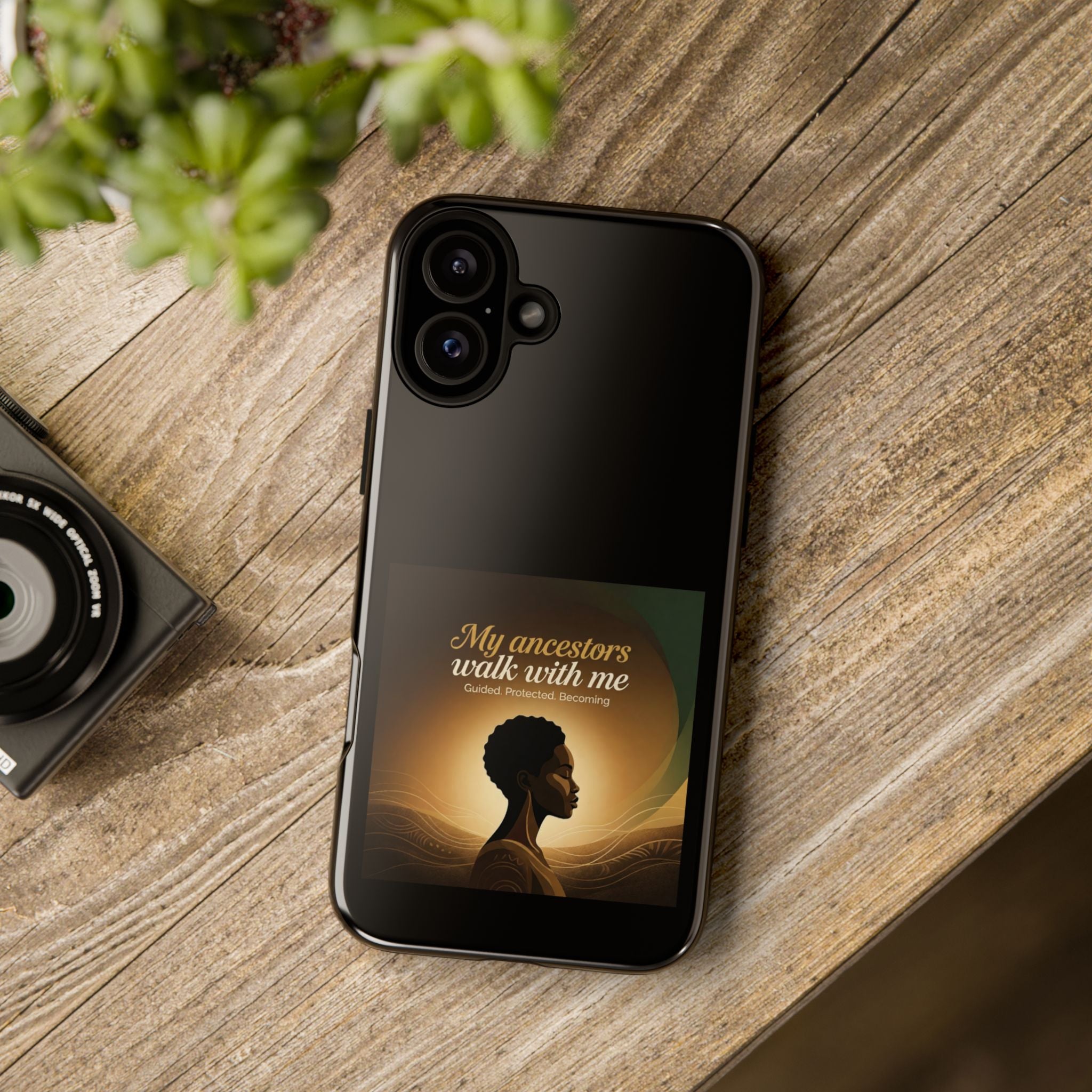 Black phone case with inspirational quote honoring heritage, designed by Printify, featuring artistic lettering on a protective cover.