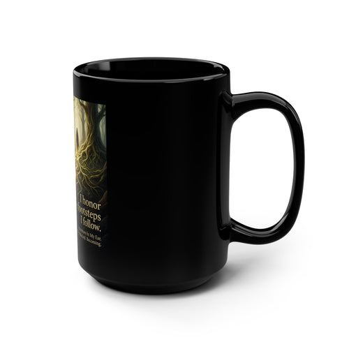 Black 15oz ceramic coffee mug with inspirational forest quote "I Honor the Footsteps I Follow" printed on the front.